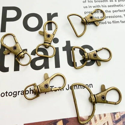 ナスカン 尾内径約 20mm 合金製 10個入り 線径1mm バッグ金具 mg0010-20